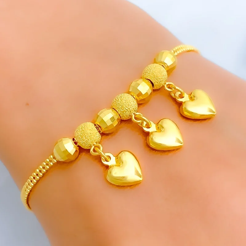 Women's anniversary bracelet-Dazzling Triple Jazzy Heart 22k Gold Bracelet