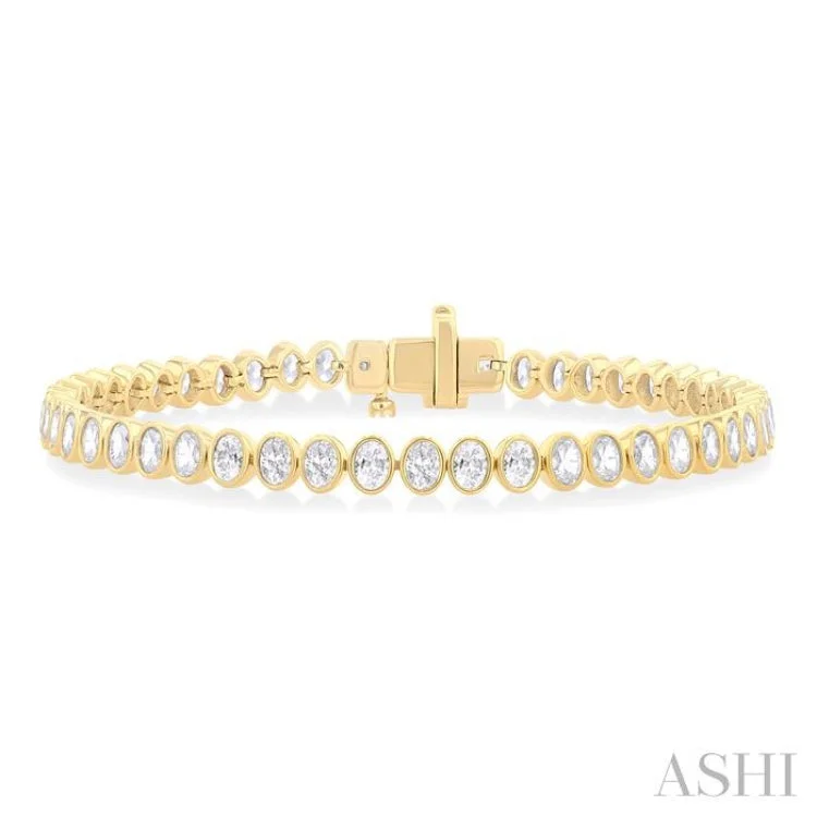 Women's festival bracelet-4 1/2 Ctw North-South Bezel Set Oval Cut Diamond Tennis Bracelet in 14K Yellow Gold