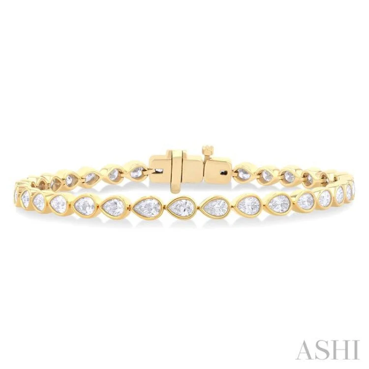 Women's charm bracelet-3 1/4 Ctw East-West Bezel Set Pear Cut Diamond Tennis Bracelet in 14K Yellow Gold