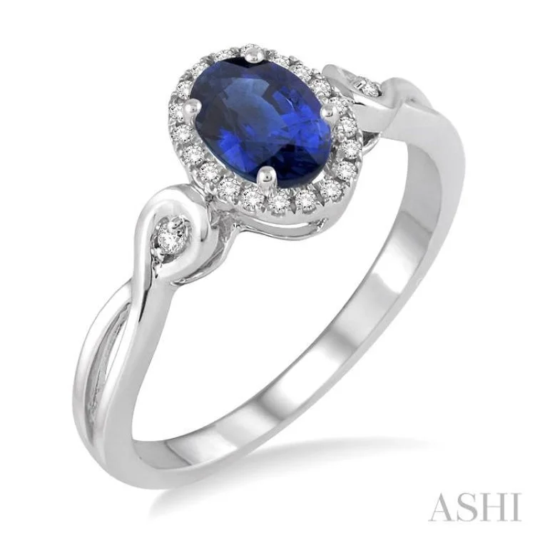 Women’s affordable engagement ring-6x4 MM Oval Cut Sapphire and 1/10 Ctw Round Cut Diamond Ring in 10K White Gold